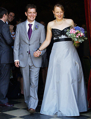 long, elegant blue and black sleeveless wedding dress